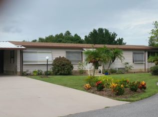 906 Cypress St, Barefoot Bay, FL 32976