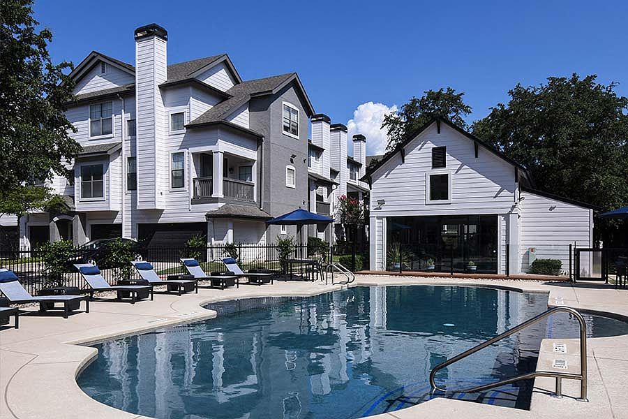 Our resort-style pool includes a sundeck with lounge seating
