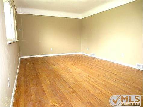 LIVING ROOM W/ HARDWOOD FLOORS