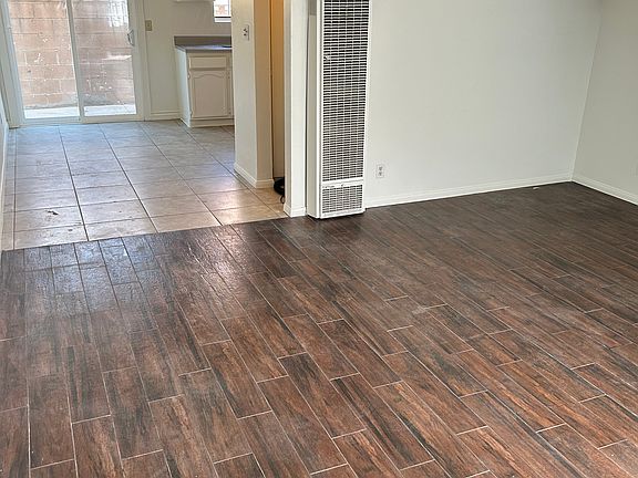living room, dining area w/ patio door