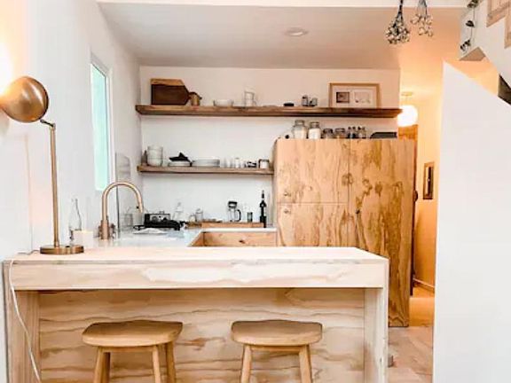 the kitchen and bar. Enjoy the projector and the hidden projection screen