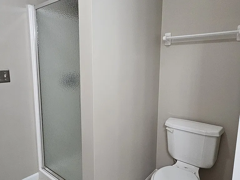 Attached bath with shower