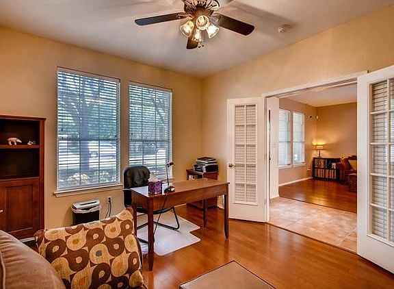 The study with French doors could double as a 5th bedroom since there's a full bath a few steps away