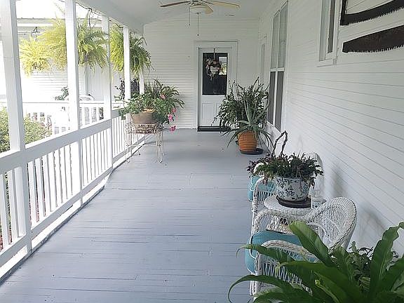 L-shaped Porch north side.