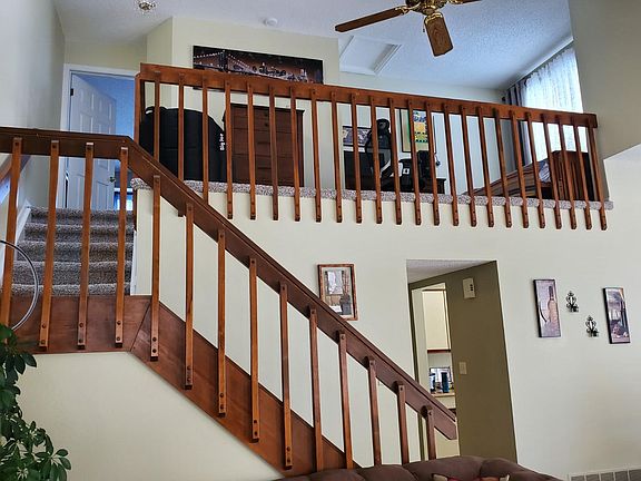 See that cozy loft to the right? It's currently a home office, but would make a wonderful reading nook as well. There's even room for a small bed.