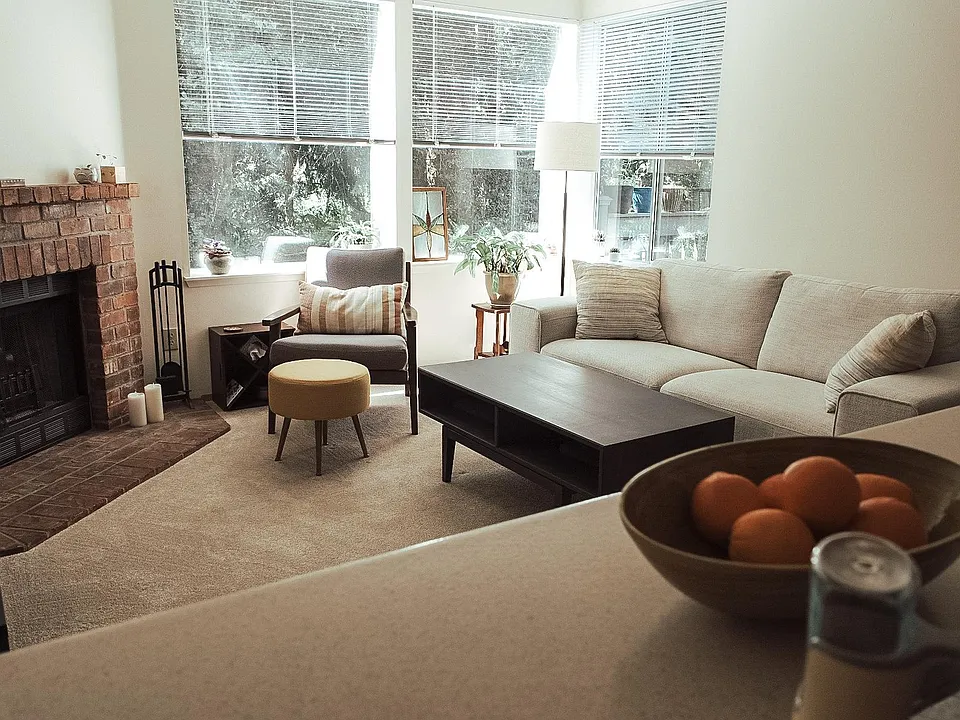 Living Room (available unit has updated vinyl flooring throughout)
