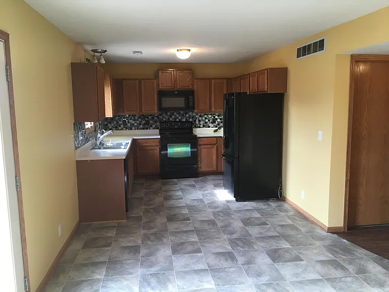 13921 Cavalier St — Photo 2