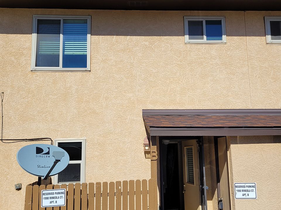 Parking side of Townhome with 2 assigned parking spots