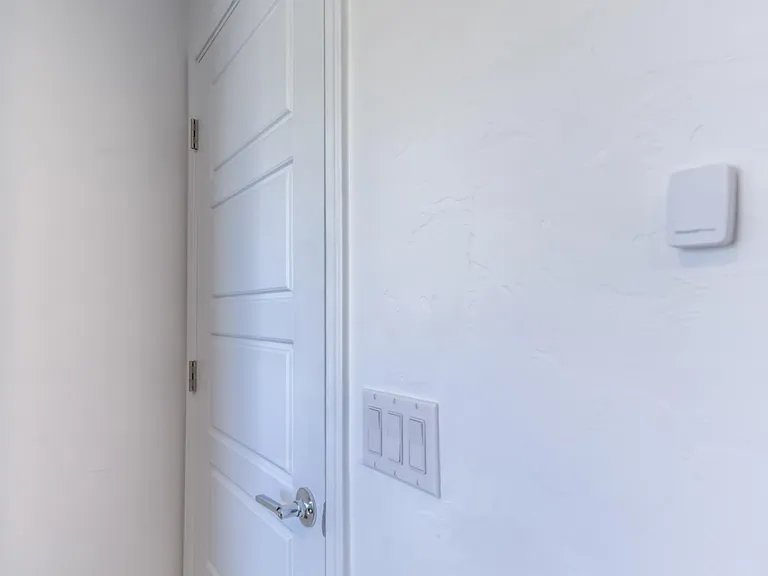 Bedroom 3 with Temperature Sensor Linked to Thermostat for Power Saving