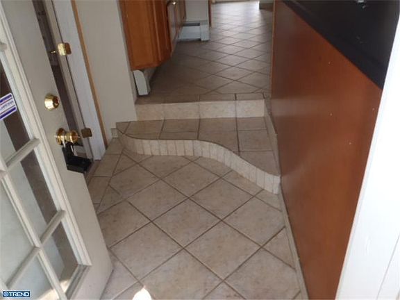 Entrance into home; kitchen