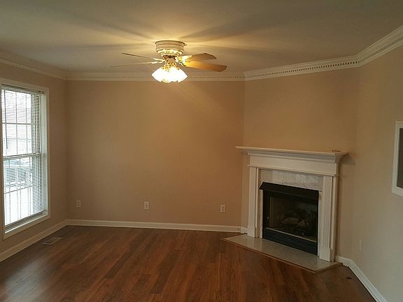 Living room with a gas fireplace.