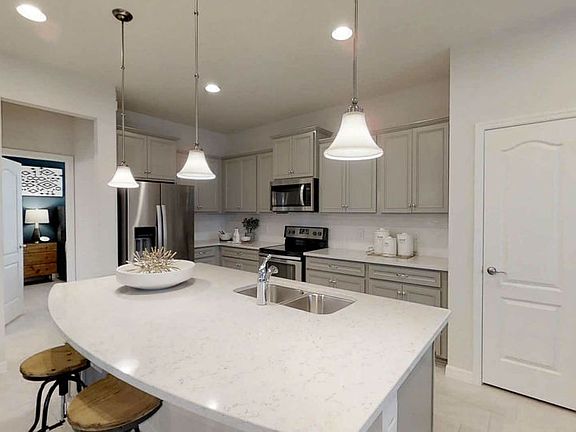 Gather Around The Island in Your New Kitchen