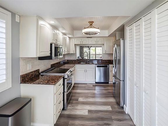 5th image of 401 150th Ave APT 231