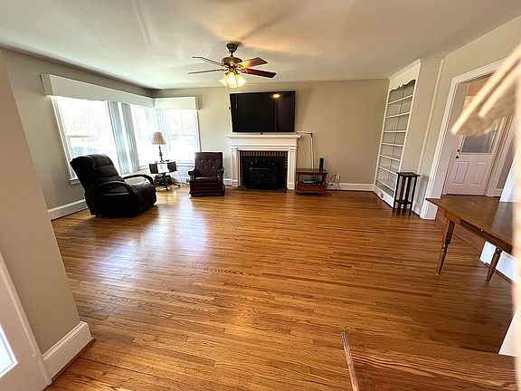 LR w/ fireplace and built in