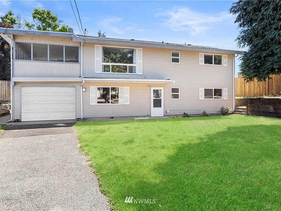 Come down to the long driveway to ample parking, large front yard, and endless possibilities. The right side of the home offers plenty of space to begin that garden you've always dreamed of. 