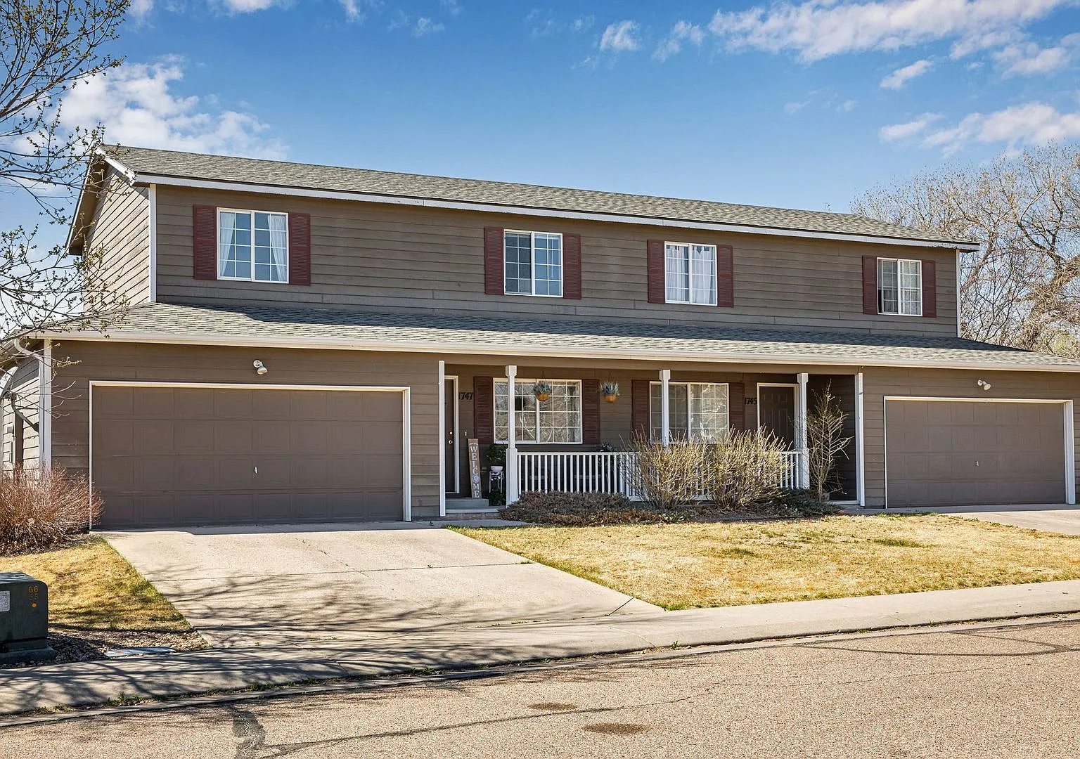 Townhouse: Base Rent $1,495 - Water, trash, Landscaping/Snow Removal and 1 Car Garage — Photo 1