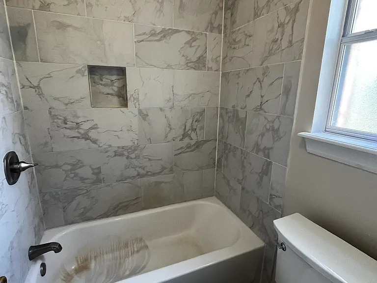 Bathroom (Shower, bathtub, and toilet)