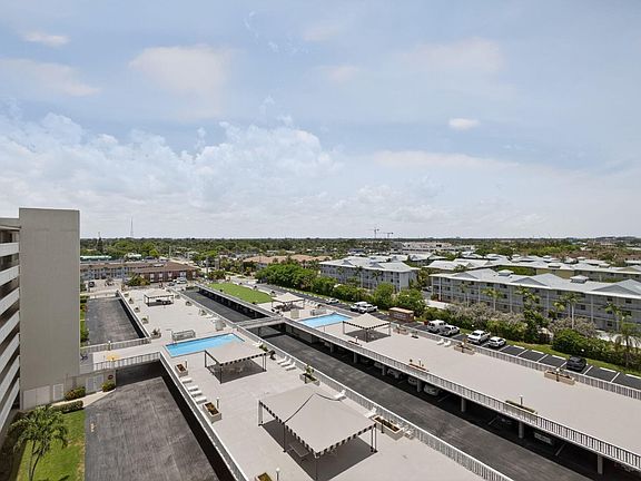 Activity area over carports facing west from building