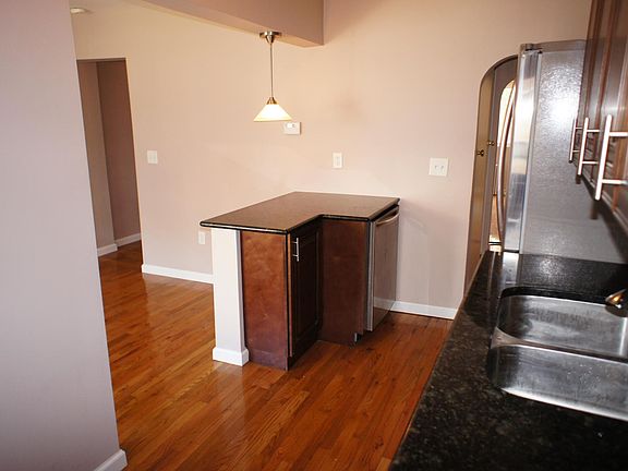 Kitchen on the right, dining room on the left