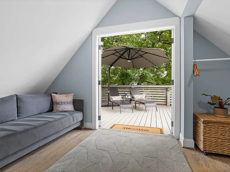 French double doors open to the deck area