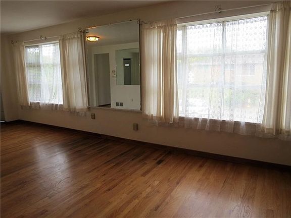 THE VIEW OF THE FAMILY ROOM FROM THE KITCHEN.  YOU WILL NOT RUN OUT OF SPACE IN THIS GREAT HOME!