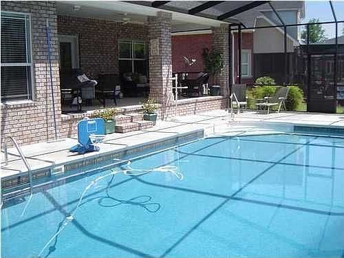Large screened in pool with covered lanai