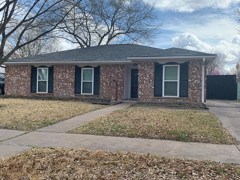 Beautiful 4 bedroom home with 2 baths, 2 car dethatched garage, and a covered patio behind a security gate for privacy.