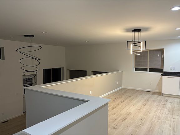Kitchen looking down to living room