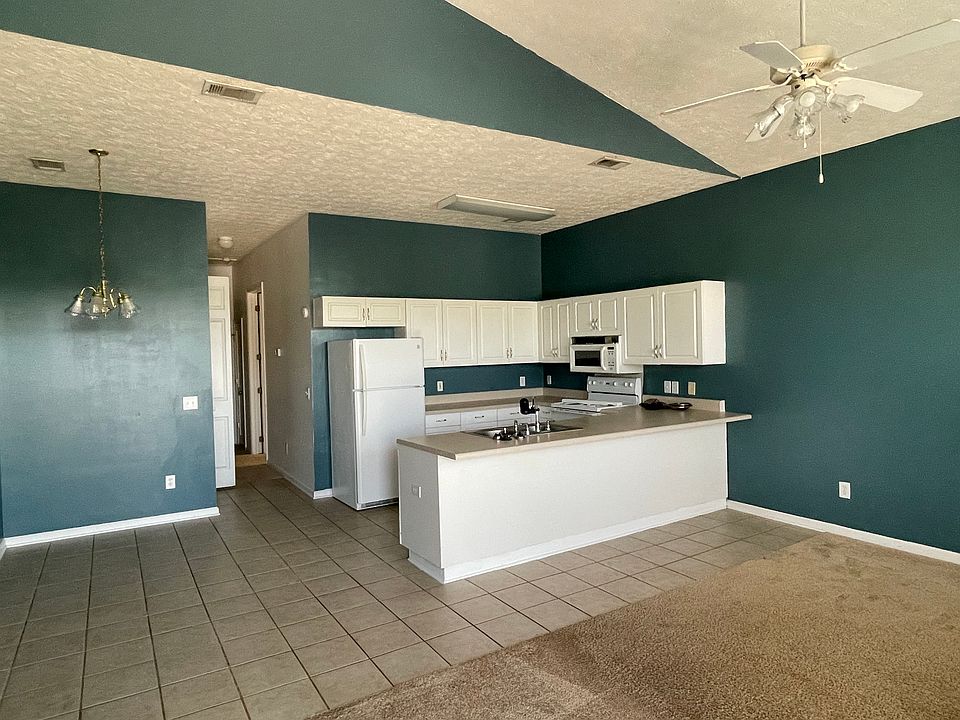 Open concept living room, kitchen and dinning area