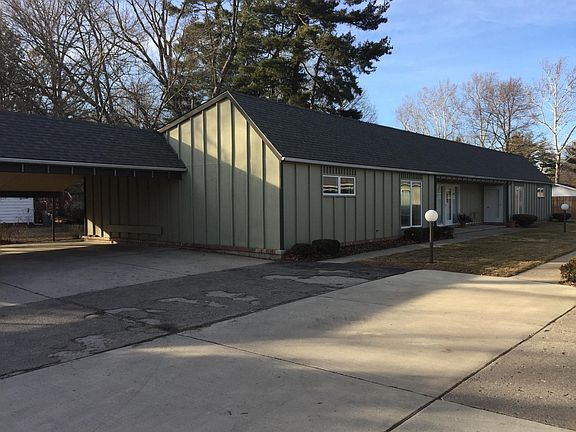 Front view showing carport