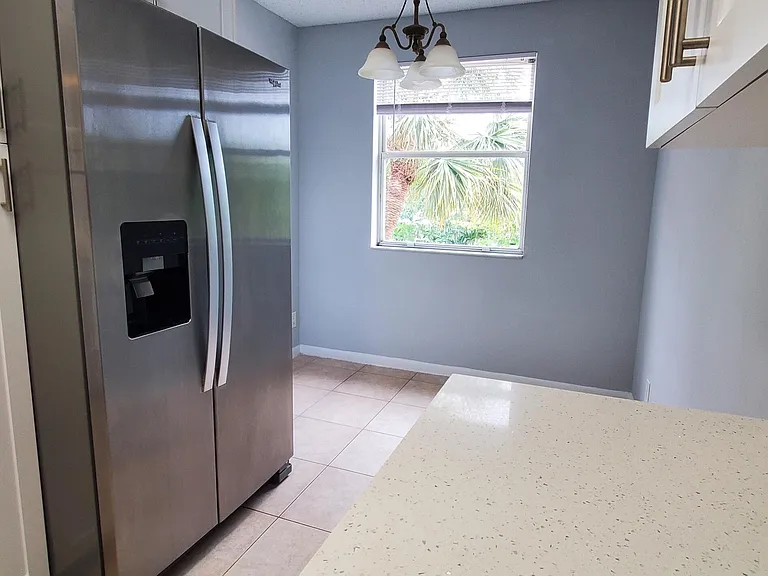 9033 Wiles Rd #308 — Photo 9