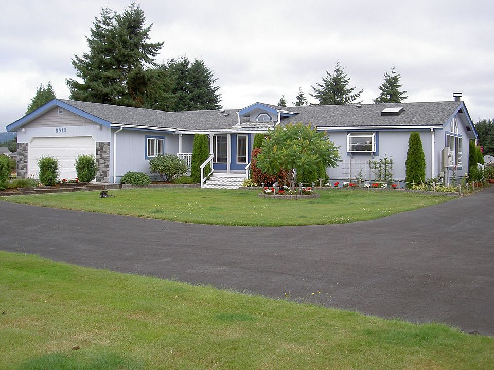 Residence with circular drive, RV parking