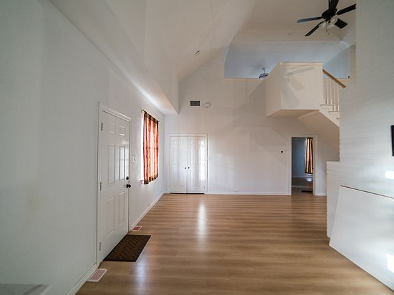 Foyer with view of the laundry closet