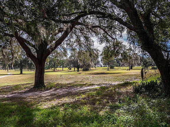 View of golf course from deck.