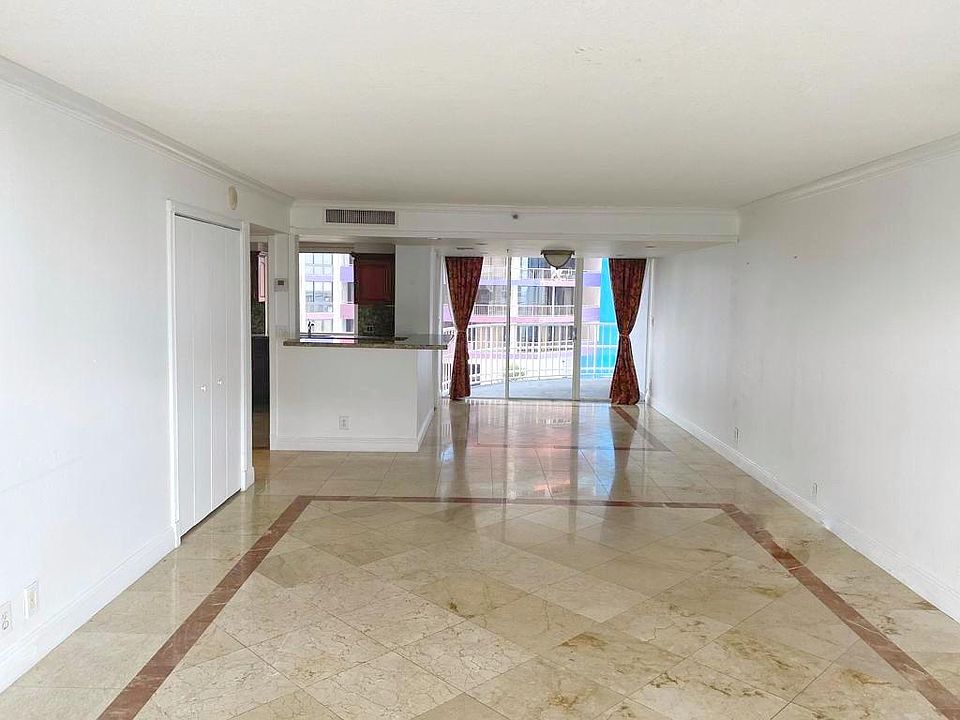 Spacious living room with an open kitchen