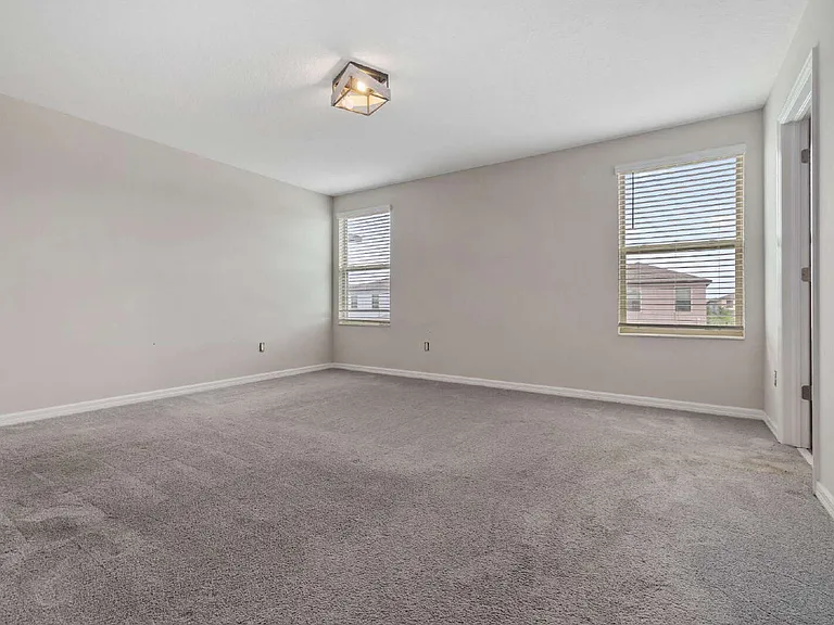 7407 Rosy Periwinkle Ct — Photo 12