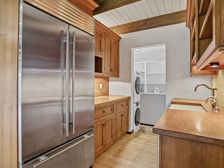 Looking toward Pantry/Laundry. Note the Spacious Sub Z refrigerator.