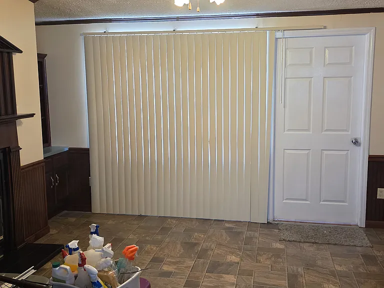 Den with Fire place with door that enters into office area