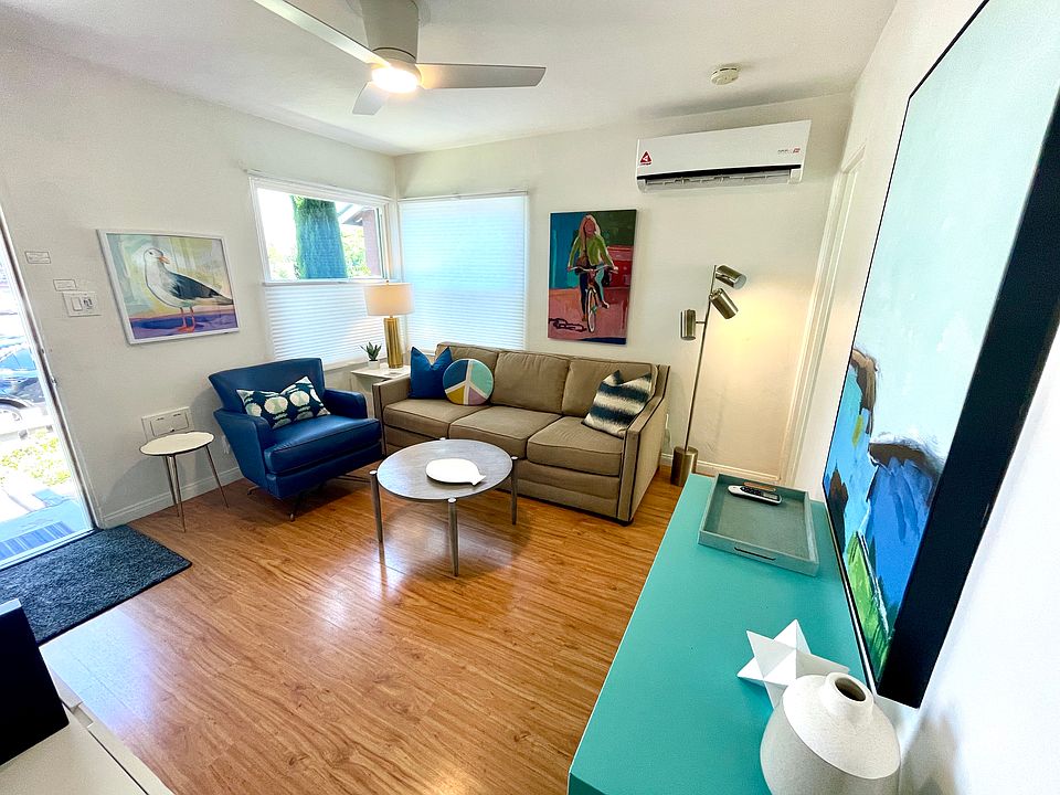 View of living room looking from bedroom. Fully air conditioned unit.