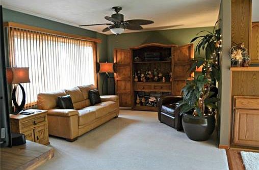 Leather sofa and chair stay with the home