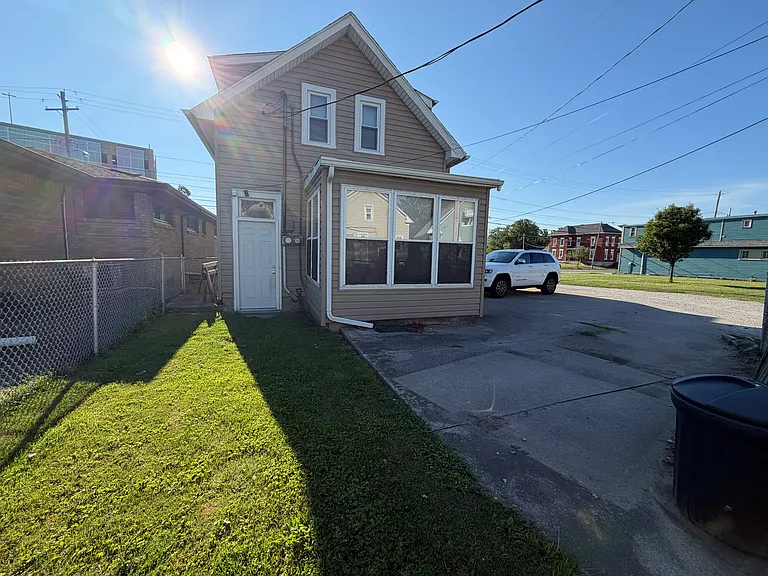 Shared yard and parking with upstairs tenant