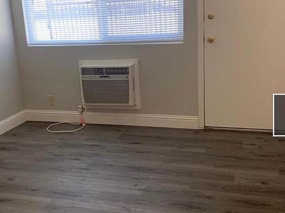 Bright living room with new flooring