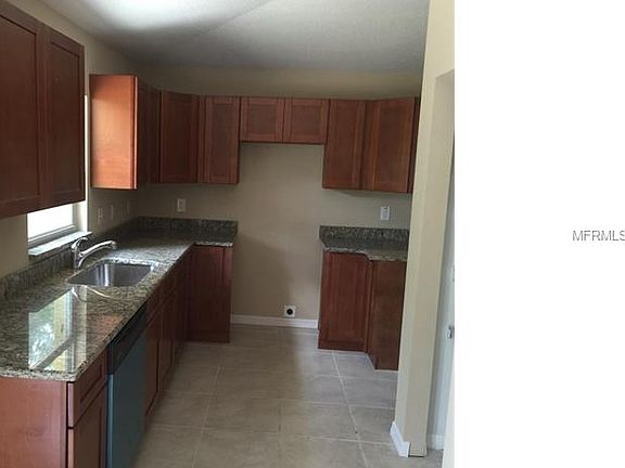 3rd image of 10802 N Annette Ave