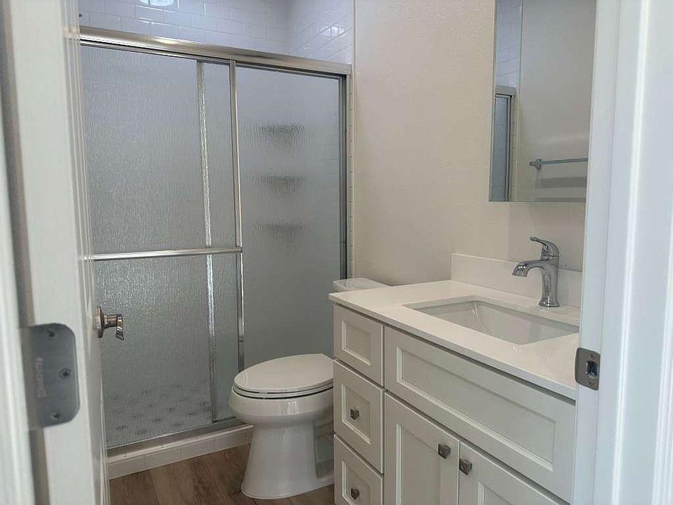 Full bathroom with large shower.