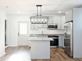 Newly Renovated One Level Downtown Residence With In-law Suite