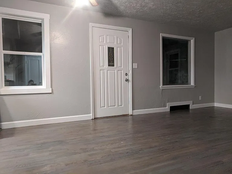 Living room with refinished hardwood floors