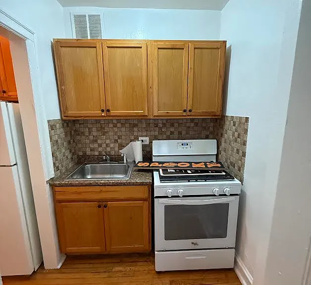 1369 W Estes Ave — Photo 3