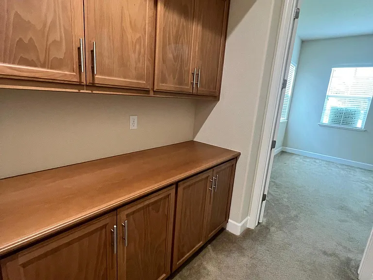 Linen closet leading to west bedroom