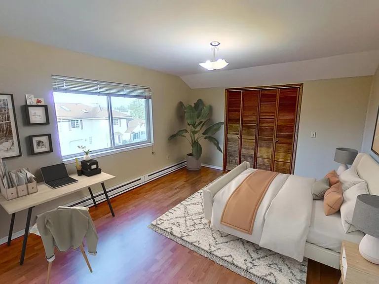 Bedroom 2. This image shows a virtually furnished space. Bedrooms come unfurnished.