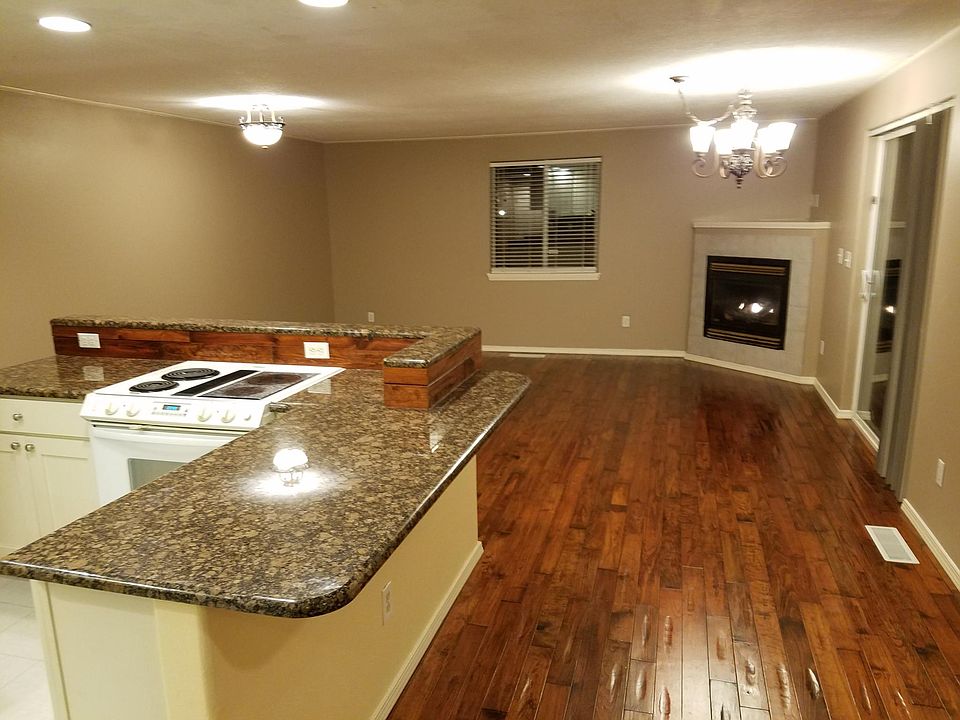 Living Area, Dining, Kitchen.